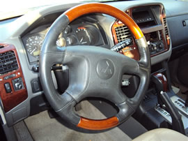 2003 MITSUBISHI MONTERO LIMITED, 3.8L AUTO 4WD, COLOR BLACK, STK 143689